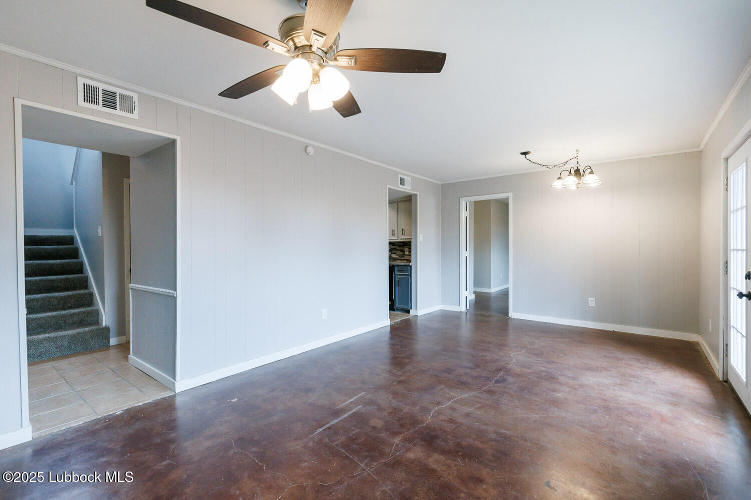 4314 52nd Street, Unit A Lubbock, TX 79413 - Photo 28 of 54 an empty room with closet and a ceiling fan