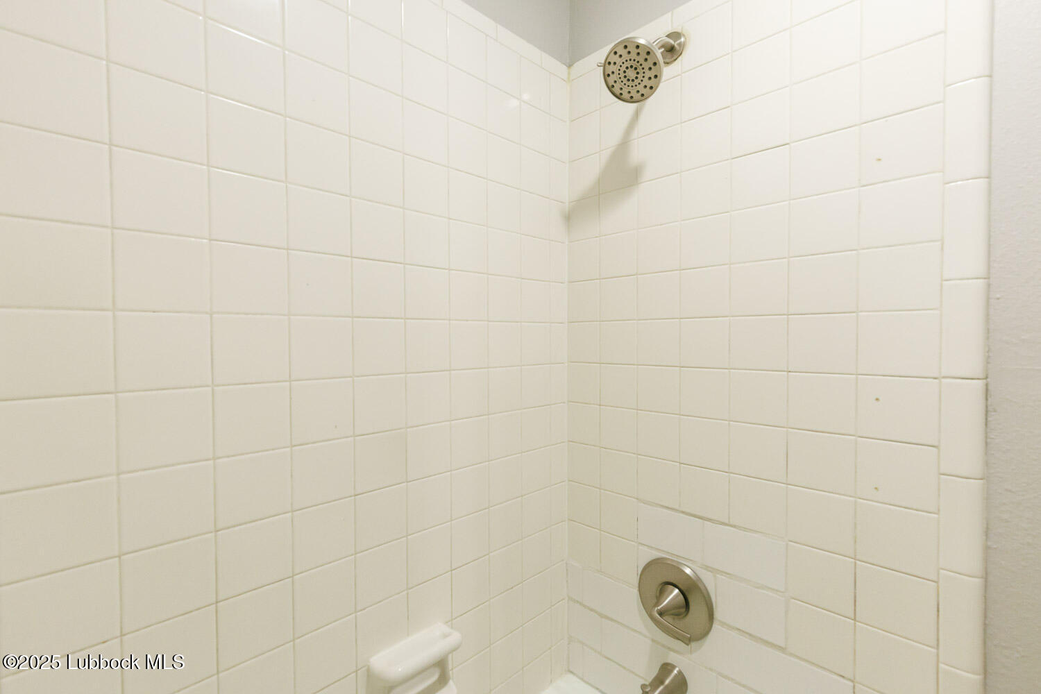 4314 52nd Street, Unit A Lubbock, TX 79413 - Photo 52 of 54 a bathroom with a shower