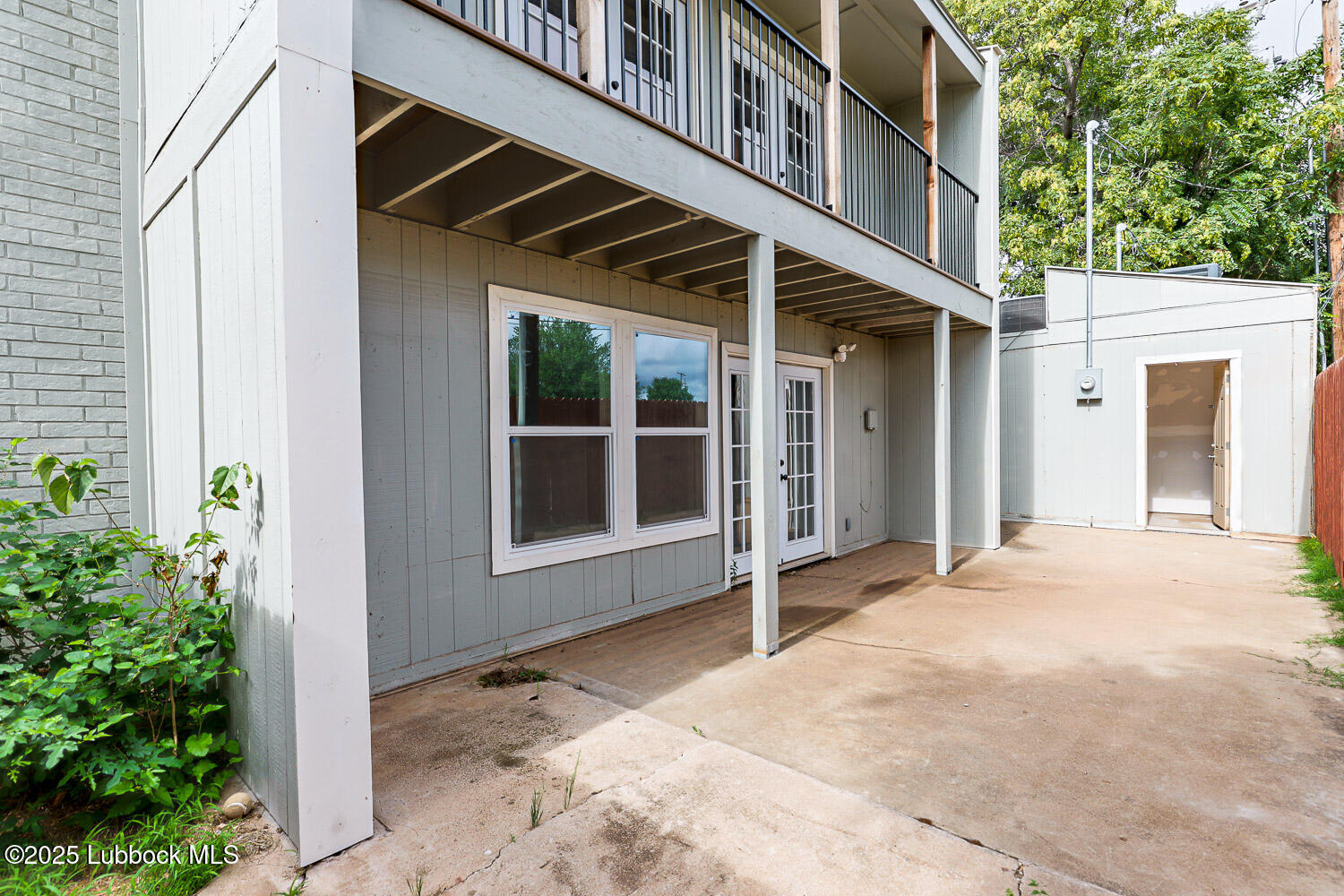 4314 52nd Street, Unit A Lubbock, TX 79413 - Photo 8 of 54 a view of a building with a outdoor space