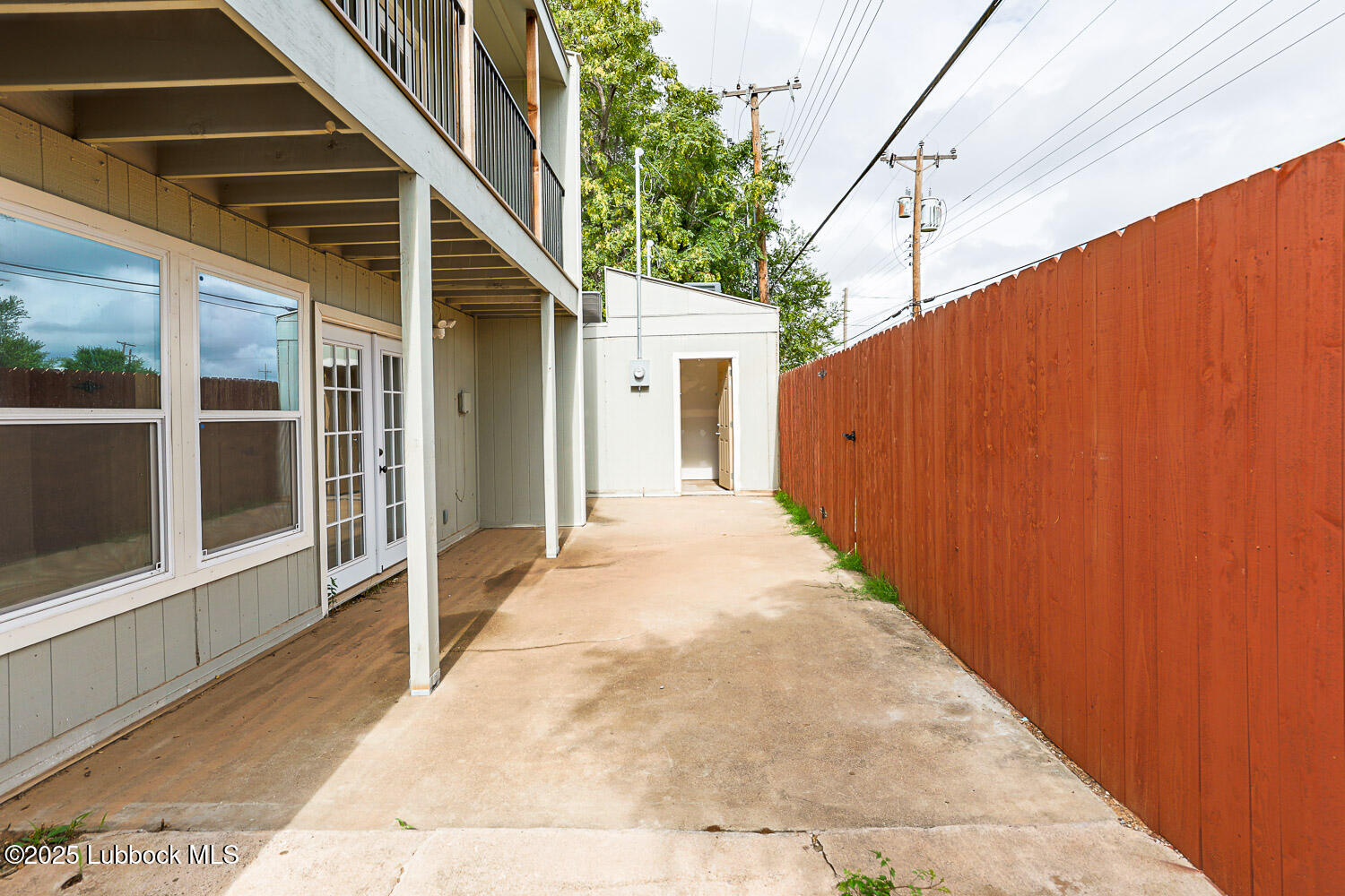 4314 52nd Street, Unit A Lubbock, TX 79413 - Photo 9 of 54 a view of a house with a backyard