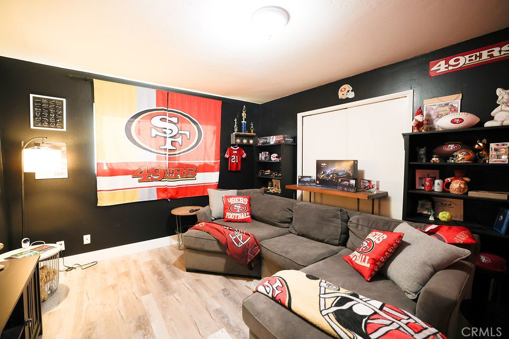 1156 3rd Street Calimesa, CA 92320 - Photo 16 of 34 a living room with furniture and a table