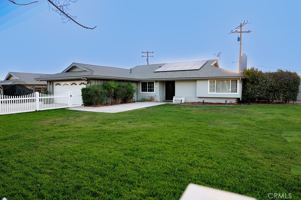 1156 3rd Street Calimesa, CA 92320 - Photo 2 of 34 a front view of a house with a yard