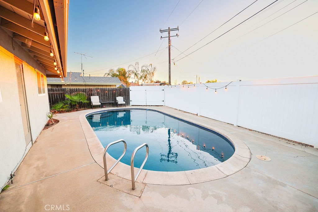 1156 3rd Street Calimesa, CA 92320 - Photo 31 of 34 a white bath tub sitting in a bathroom next to a window