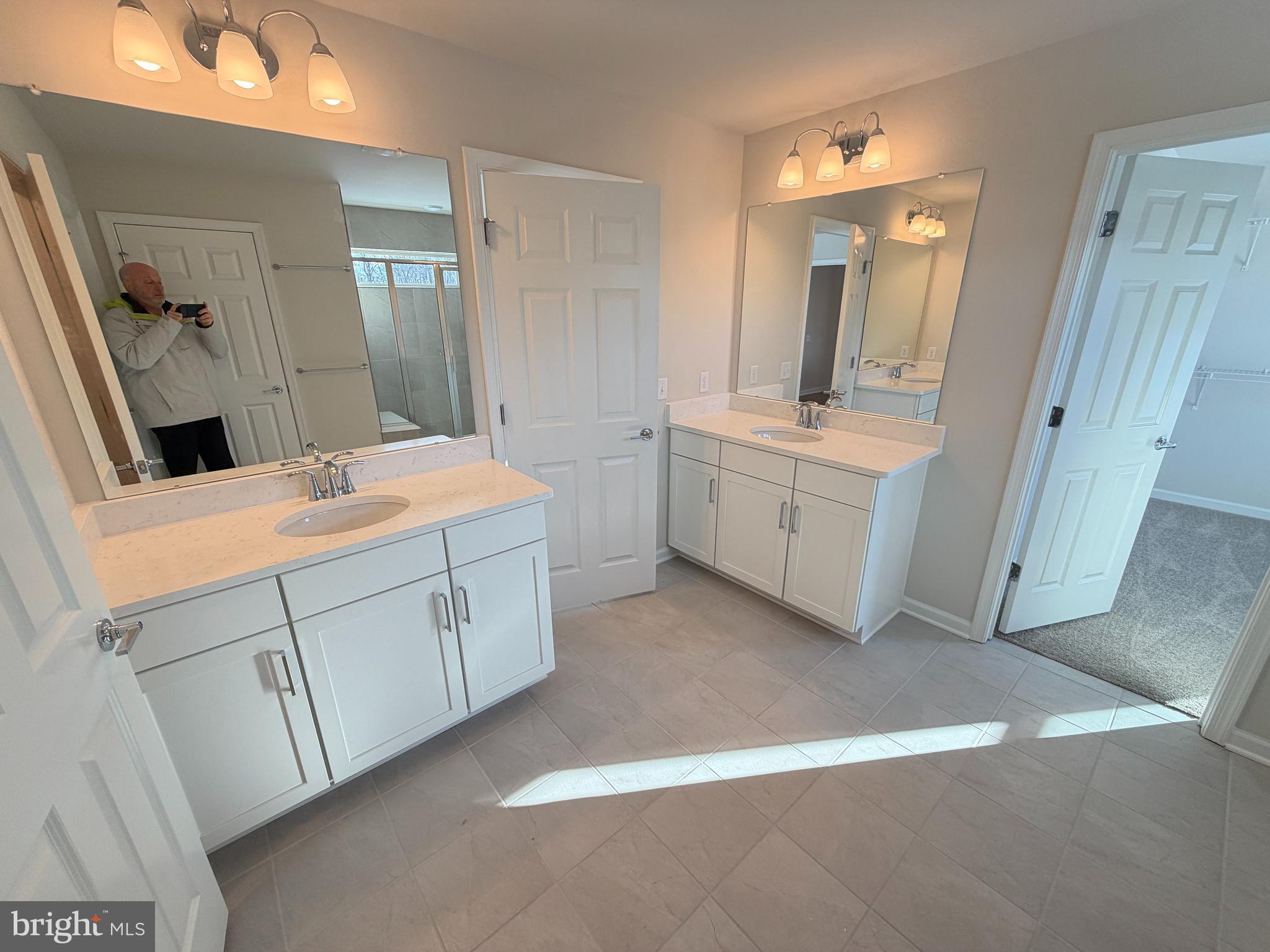 604 Liberty Ridge Road Horsham, PA 19044 - Photo 6 of 15 a spacious bathroom with a double vanity sink mirror and