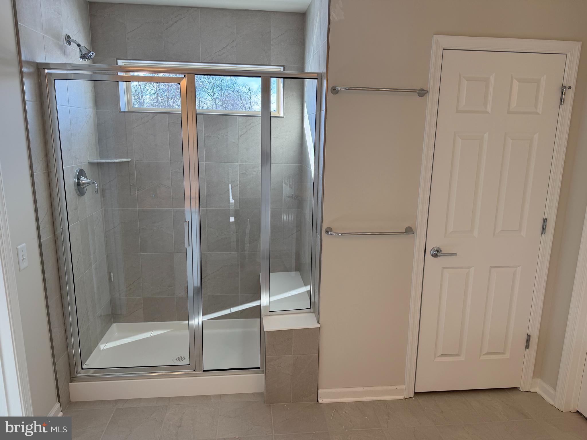 604 Liberty Ridge Road Horsham, PA 19044 - Photo 7 of 15 a bathroom with a glass shower door