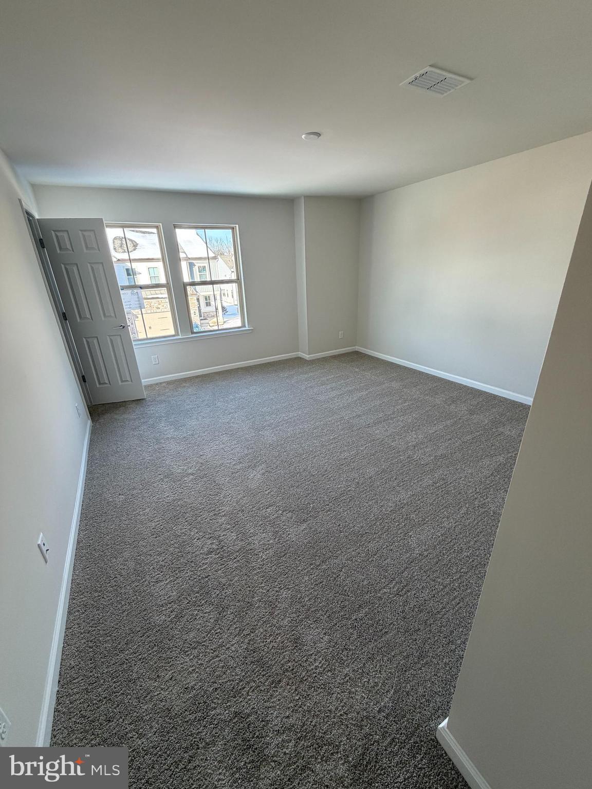 604 Liberty Ridge Road Horsham, PA 19044 - Photo 10 of 15 a view of an empty room with a window and fireplace