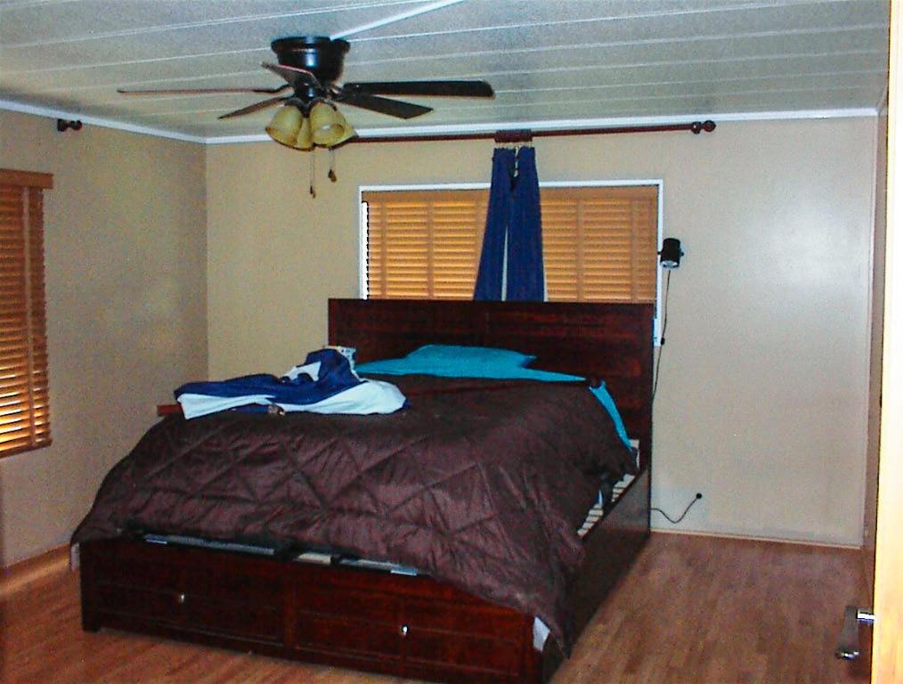 37314 Mistletoe Road Squaw Valley, CA 93675 - Photo 16 of 27 a bedroom with a bed and a window