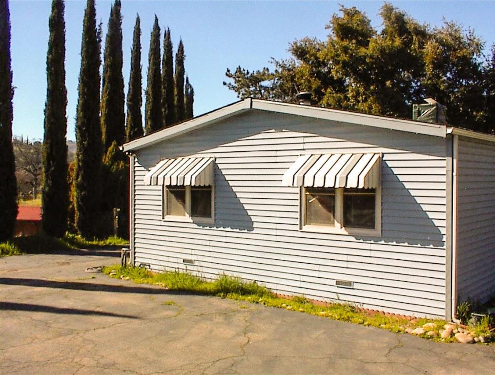 37314 Mistletoe Road Squaw Valley, CA 93675 - Photo 4 of 27 a view of a house with a garage
