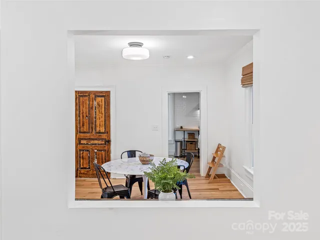 a view of a workspace with furniture