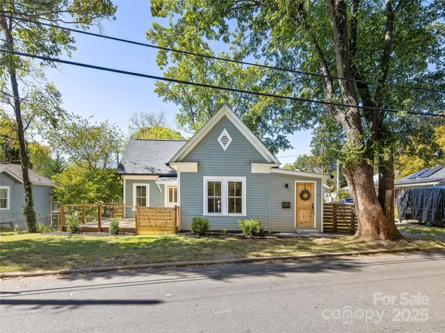 a view of a house with a street