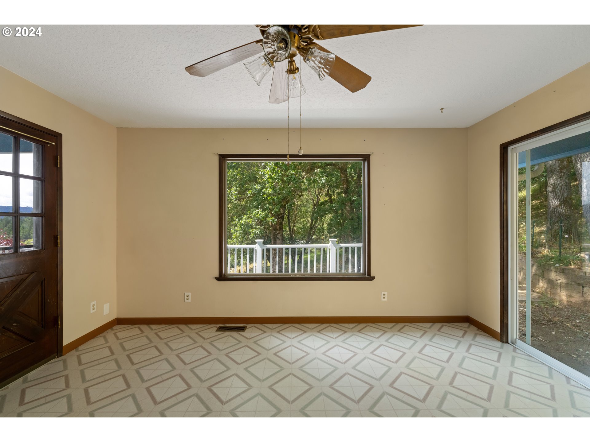 1234 Spring Brook Road Myrtle Creek, OR 97457 - Photo 8 of 45 a view of an empty room and window