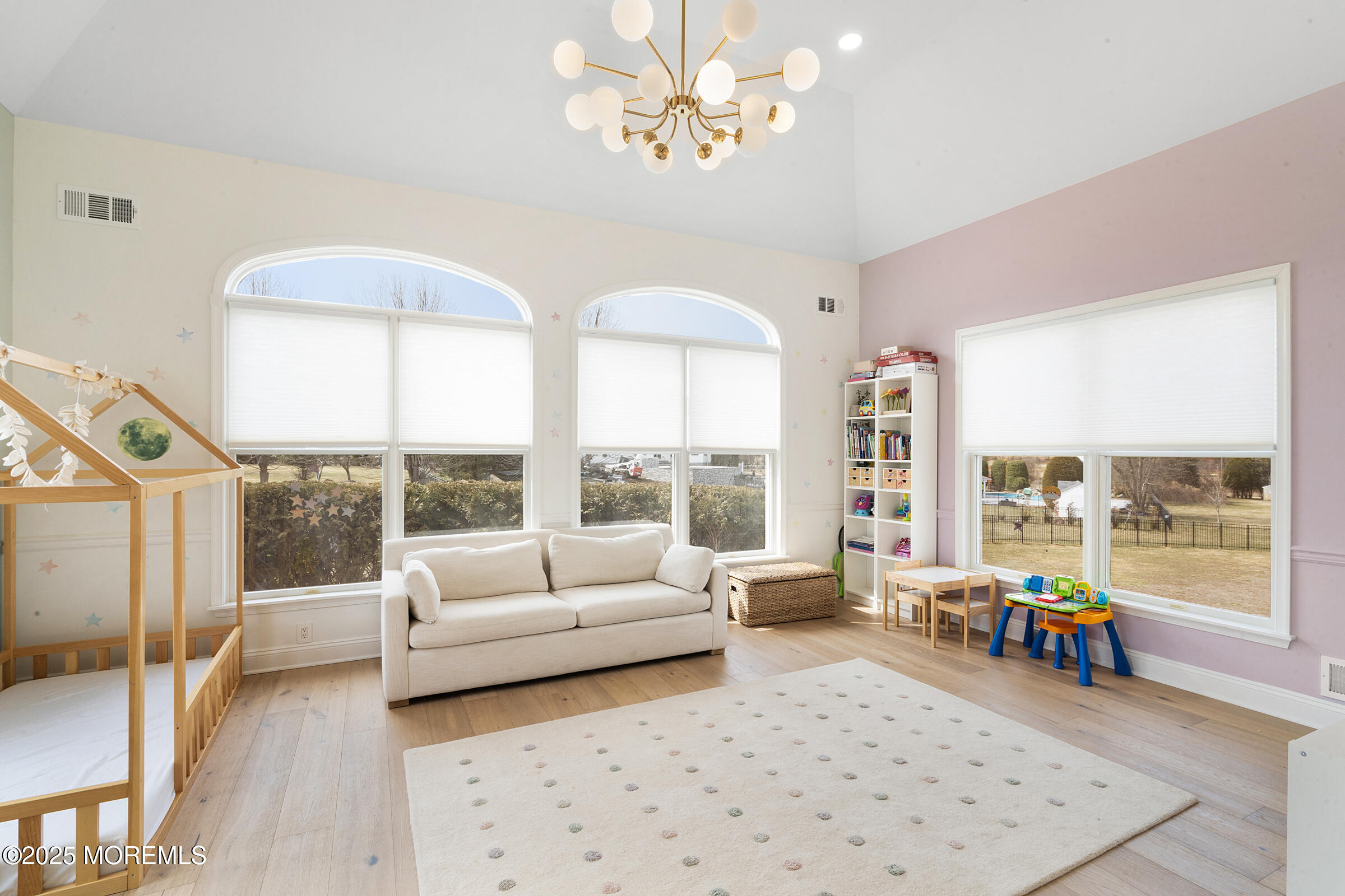 57 Moore Road Marlboro, NJ 07746 - Photo 16 of 53 a living room with furniture and a large window
