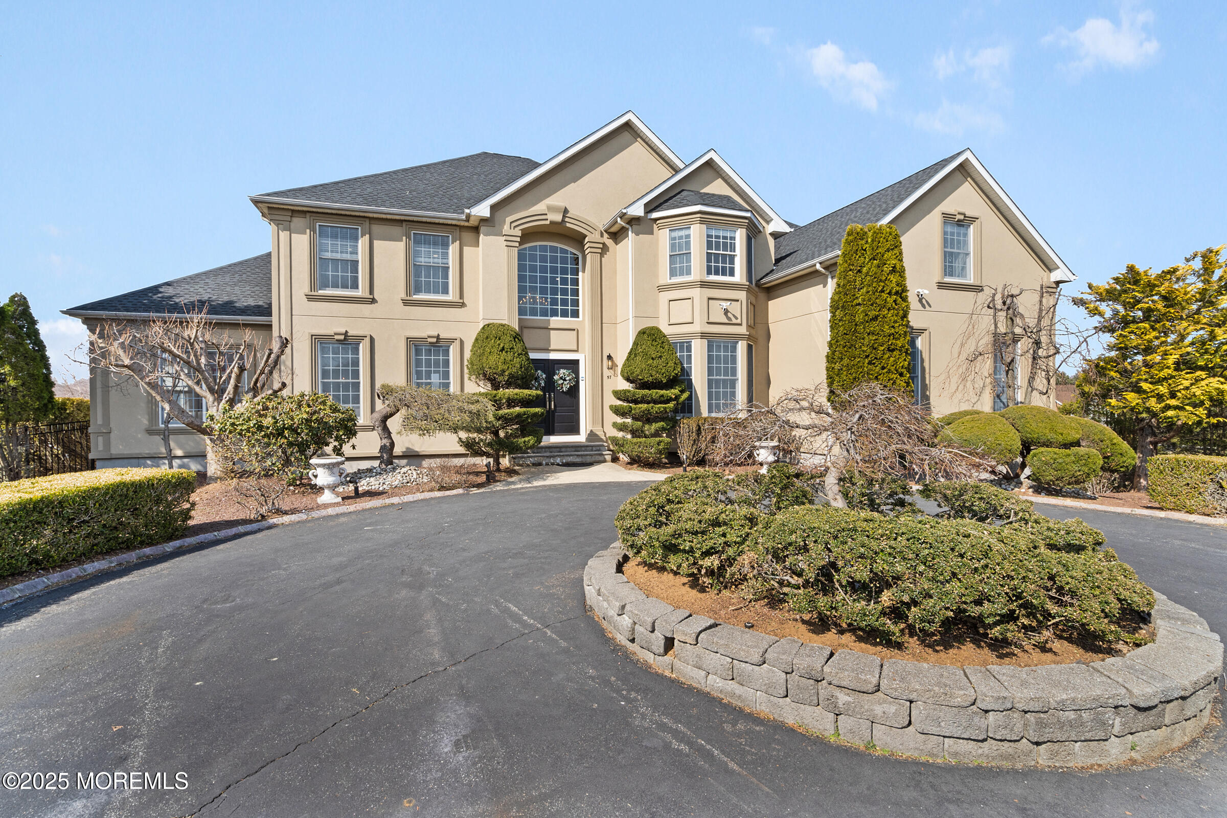 57 Moore Road Marlboro, NJ 07746 - Photo 2 of 53 a view of a house with a outdoor space