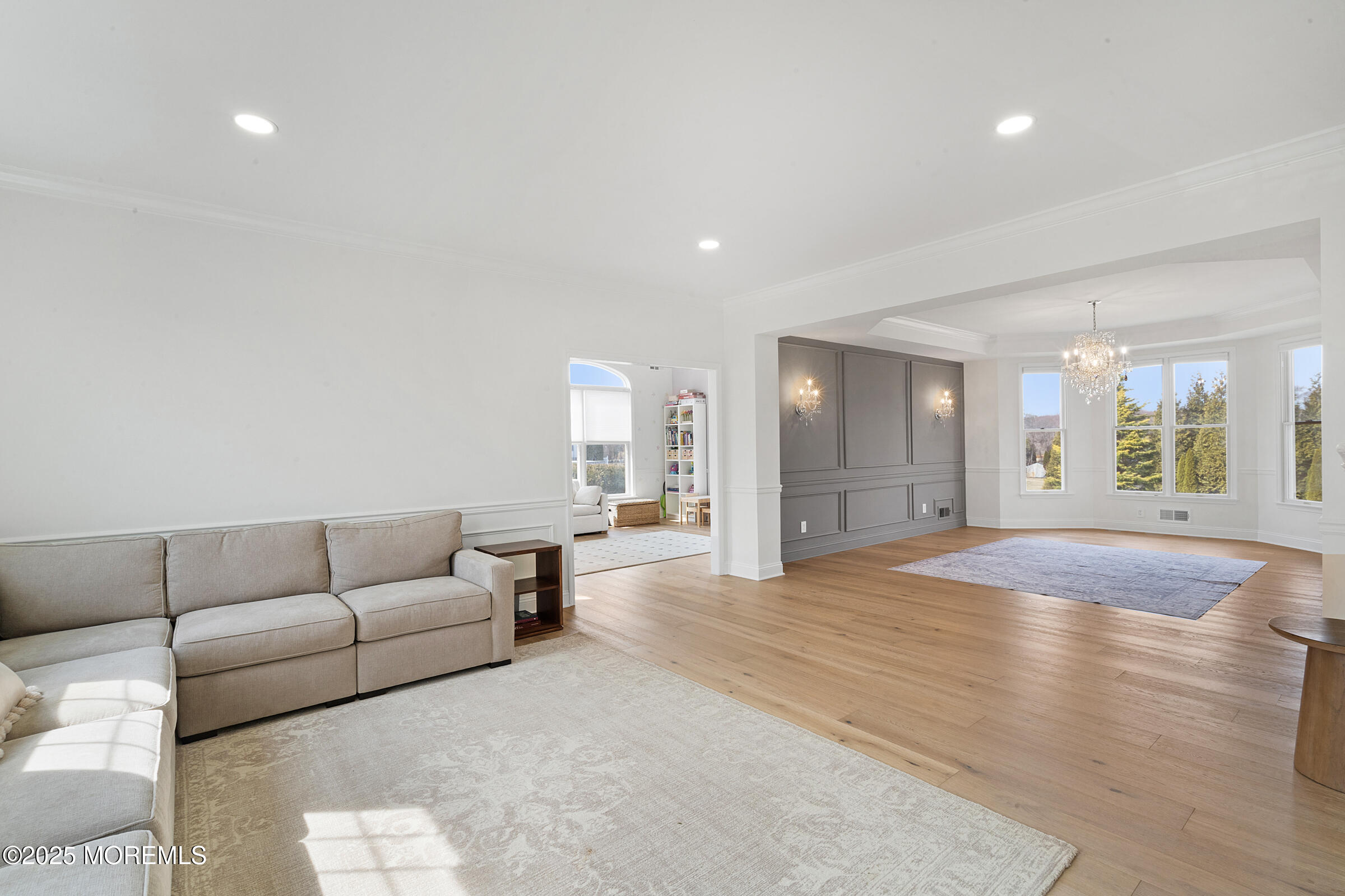 57 Moore Road Marlboro, NJ 07746 - Photo 22 of 53 a living room with furniture and a couch