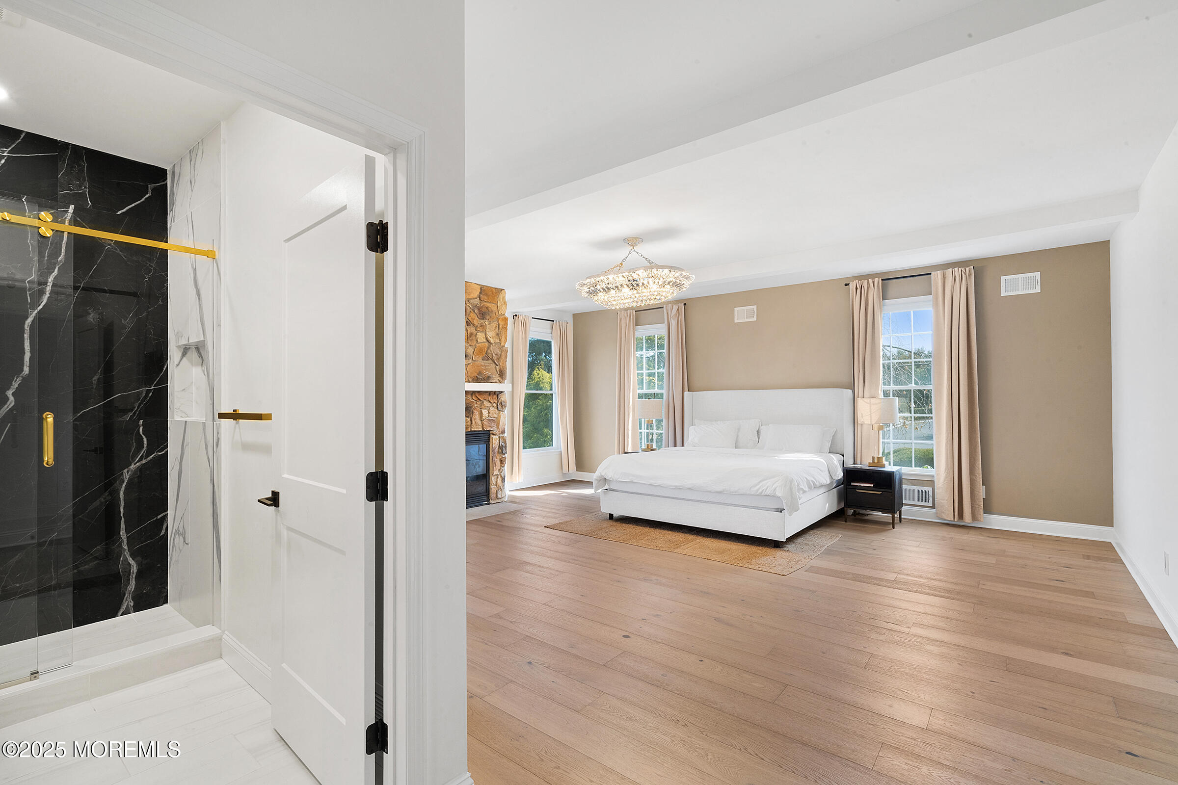 57 Moore Road Marlboro, NJ 07746 - Photo 25 of 53 a living room with furniture and a large mirror