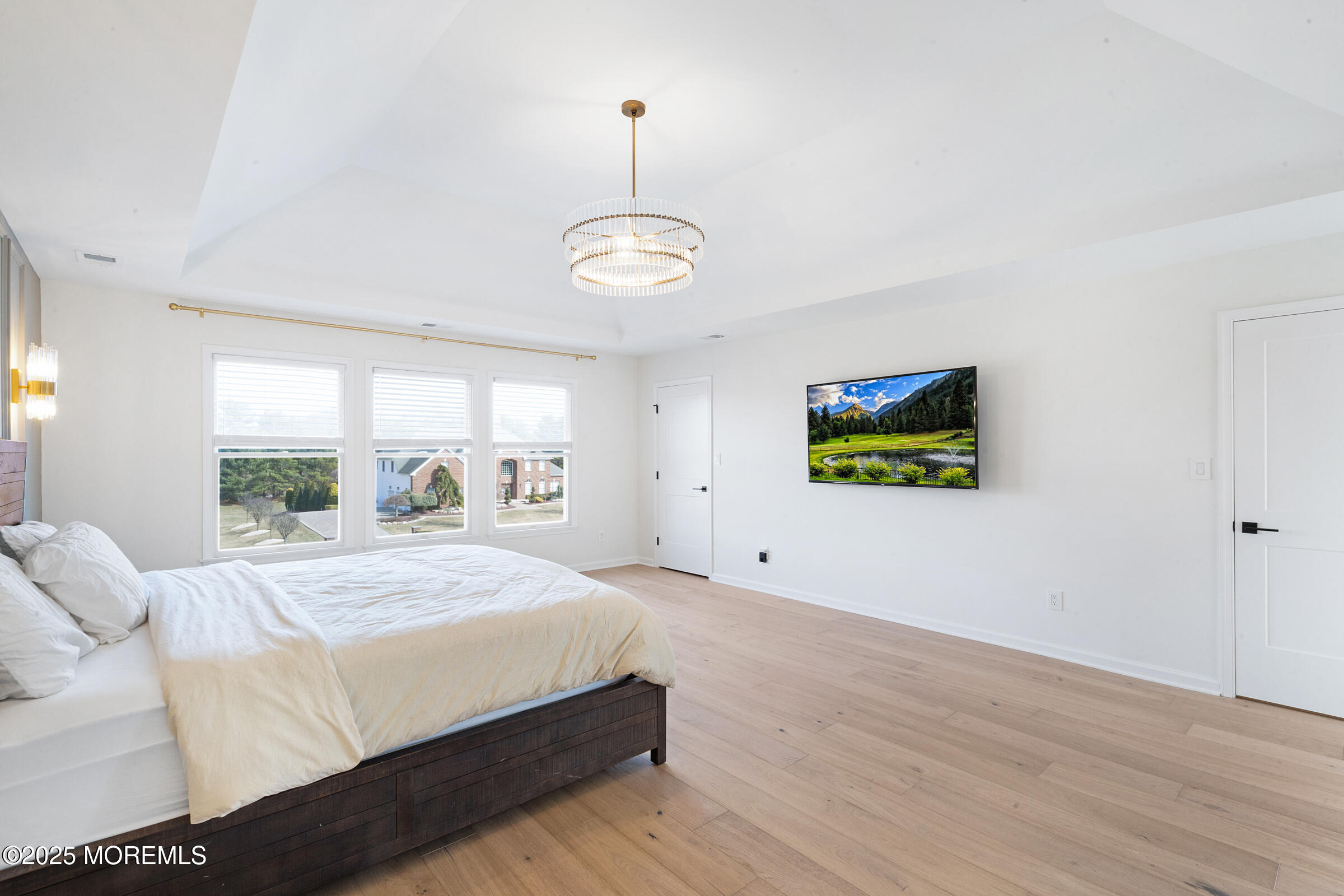 57 Moore Road Marlboro, NJ 07746 - Photo 29 of 53 a bedroom with a bed and a window