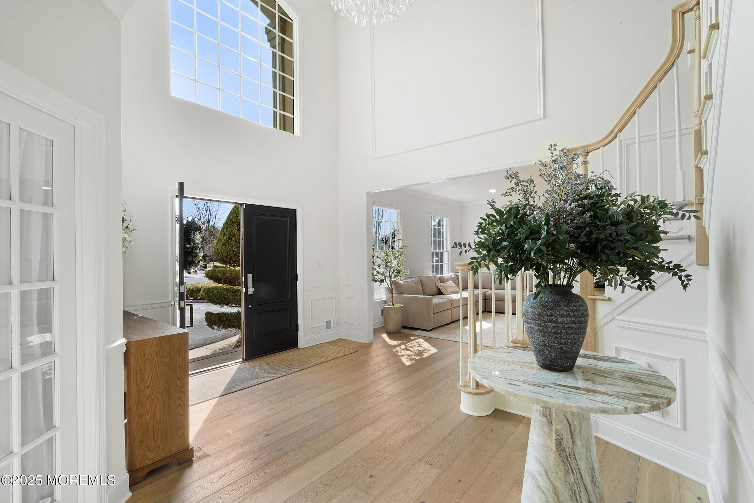 57 Moore Road Marlboro, NJ 07746 - Photo 3 of 53 a living room with furniture and a potted plant