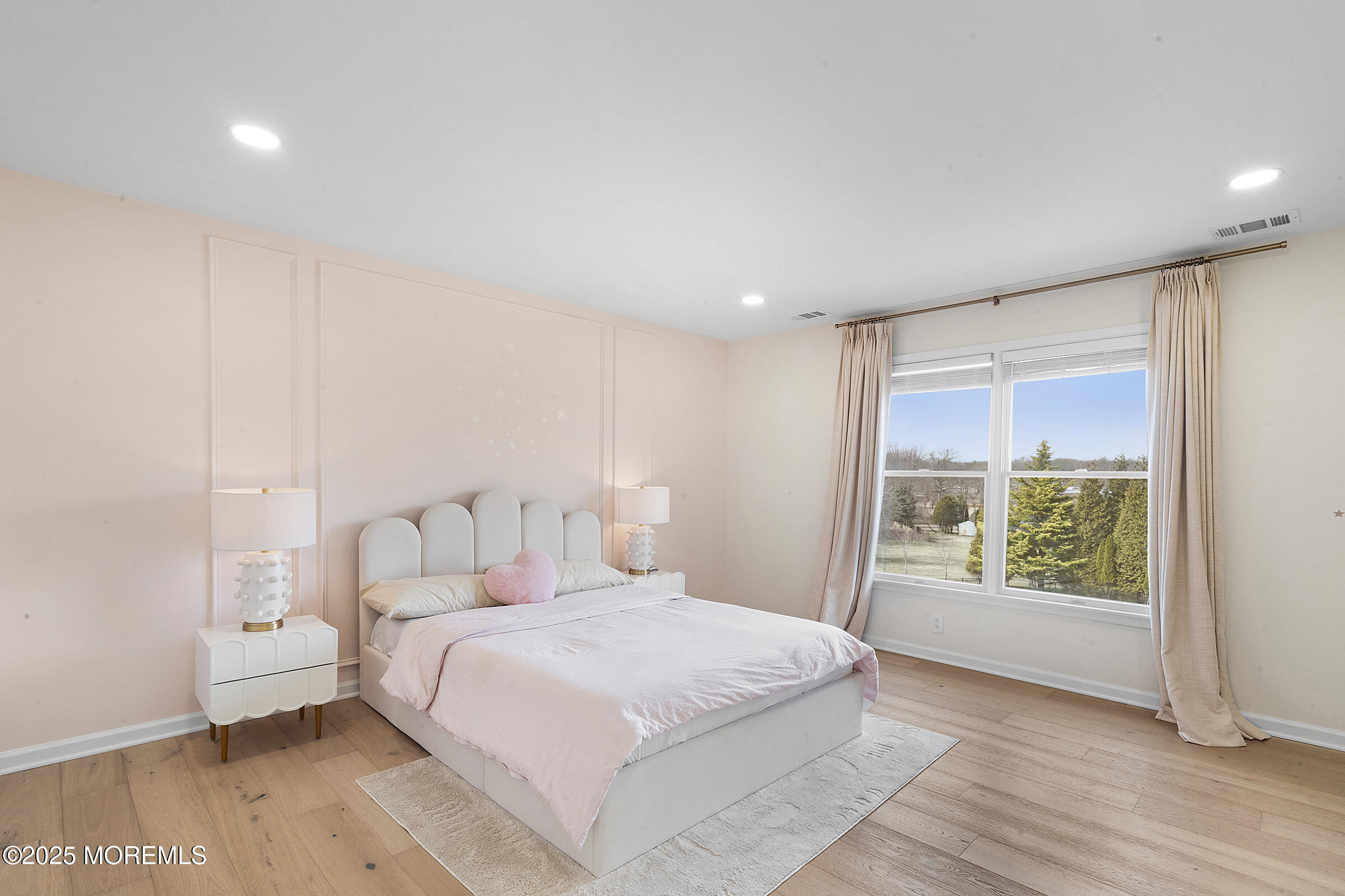57 Moore Road Marlboro, NJ 07746 - Photo 33 of 53 a bedroom with a large bed and a large window
