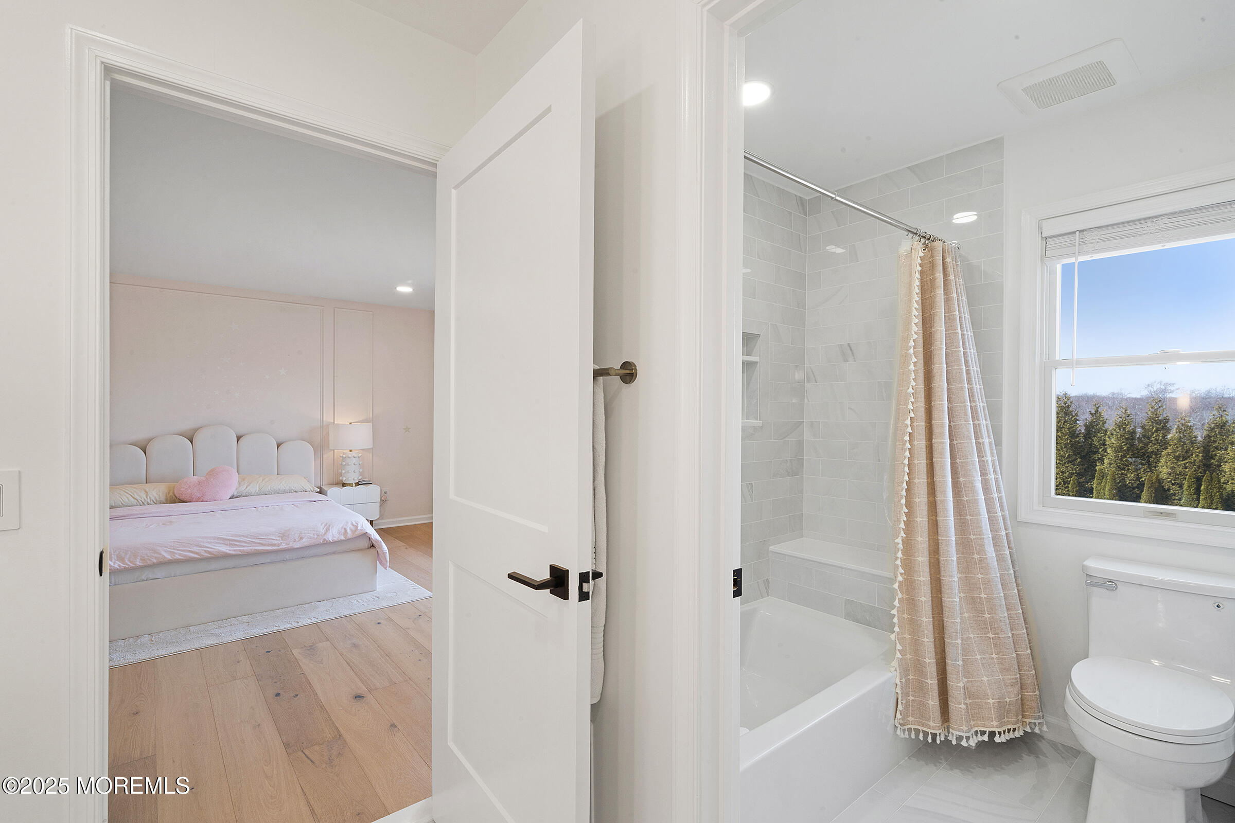 57 Moore Road Marlboro, NJ 07746 - Photo 35 of 53 a bathroom with a granite countertop sink toilet and shower