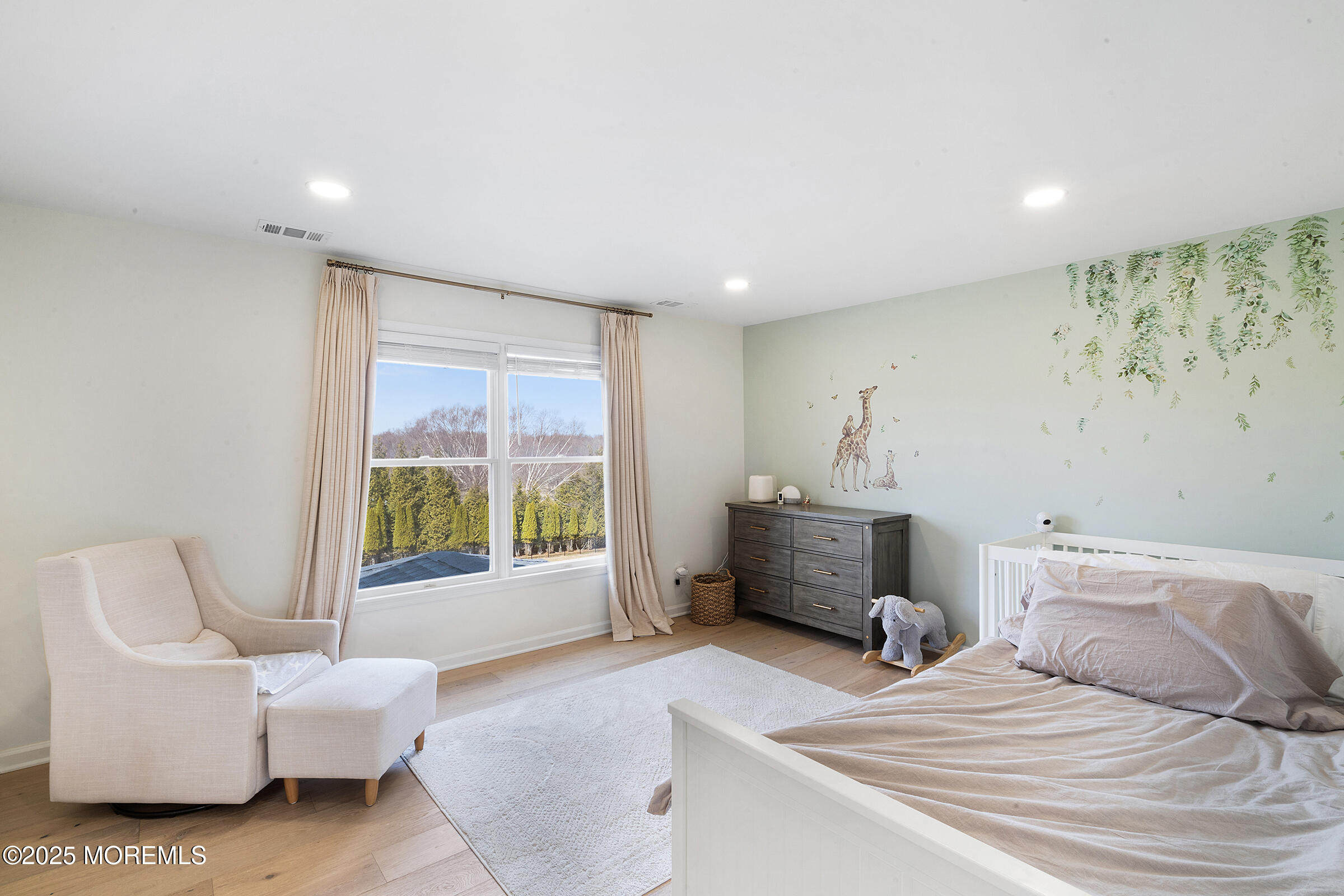 57 Moore Road Marlboro, NJ 07746 - Photo 37 of 53 a bedroom with furniture and a window
