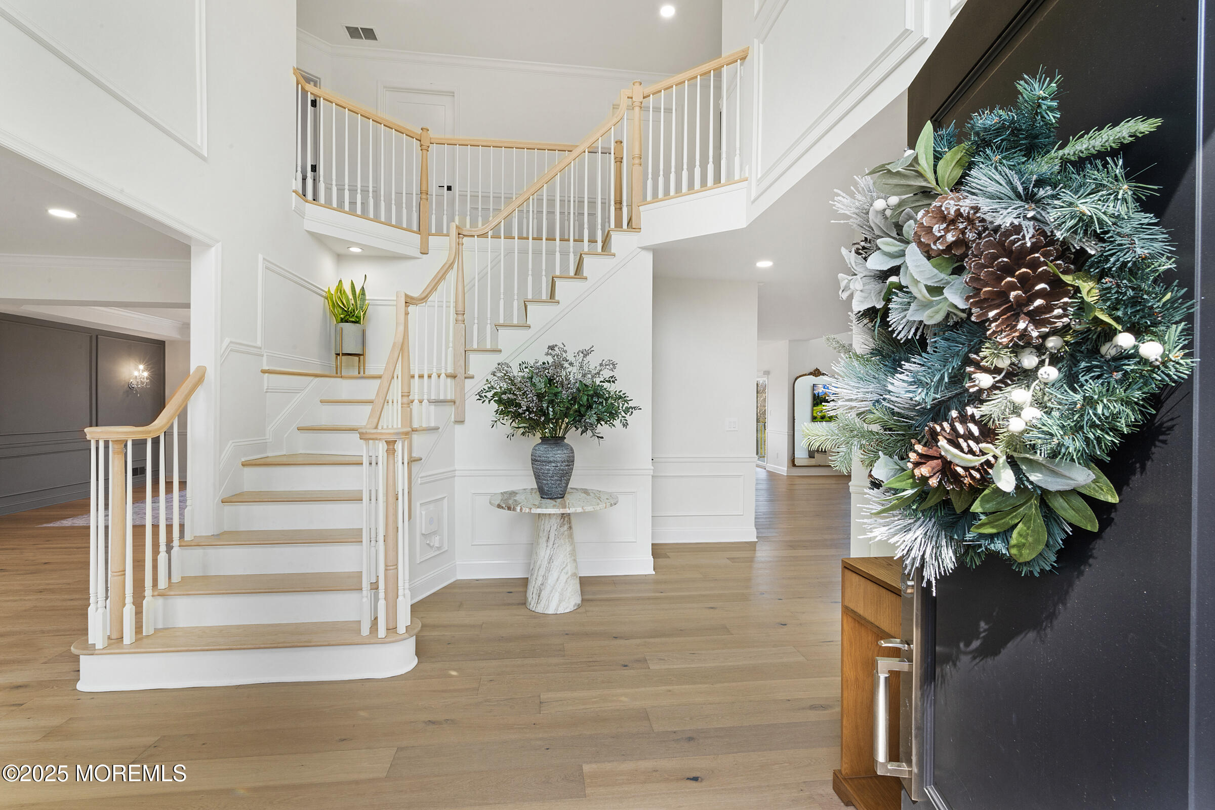 57 Moore Road Marlboro, NJ 07746 - Photo 4 of 53 a view of stairs with wooden floor