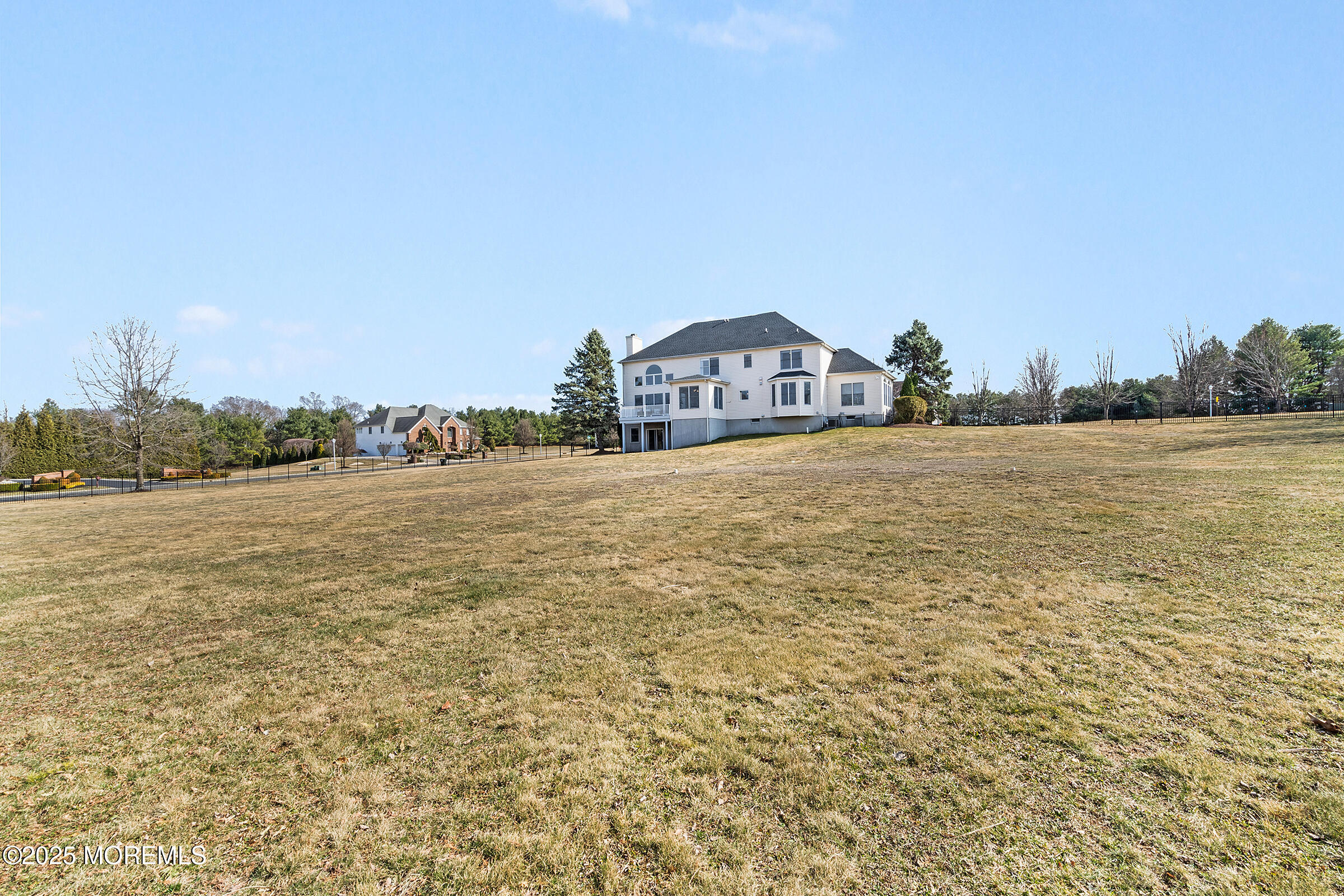57 Moore Road Marlboro, NJ 07746 - Photo 41 of 53 a view of a lake with houses in the background