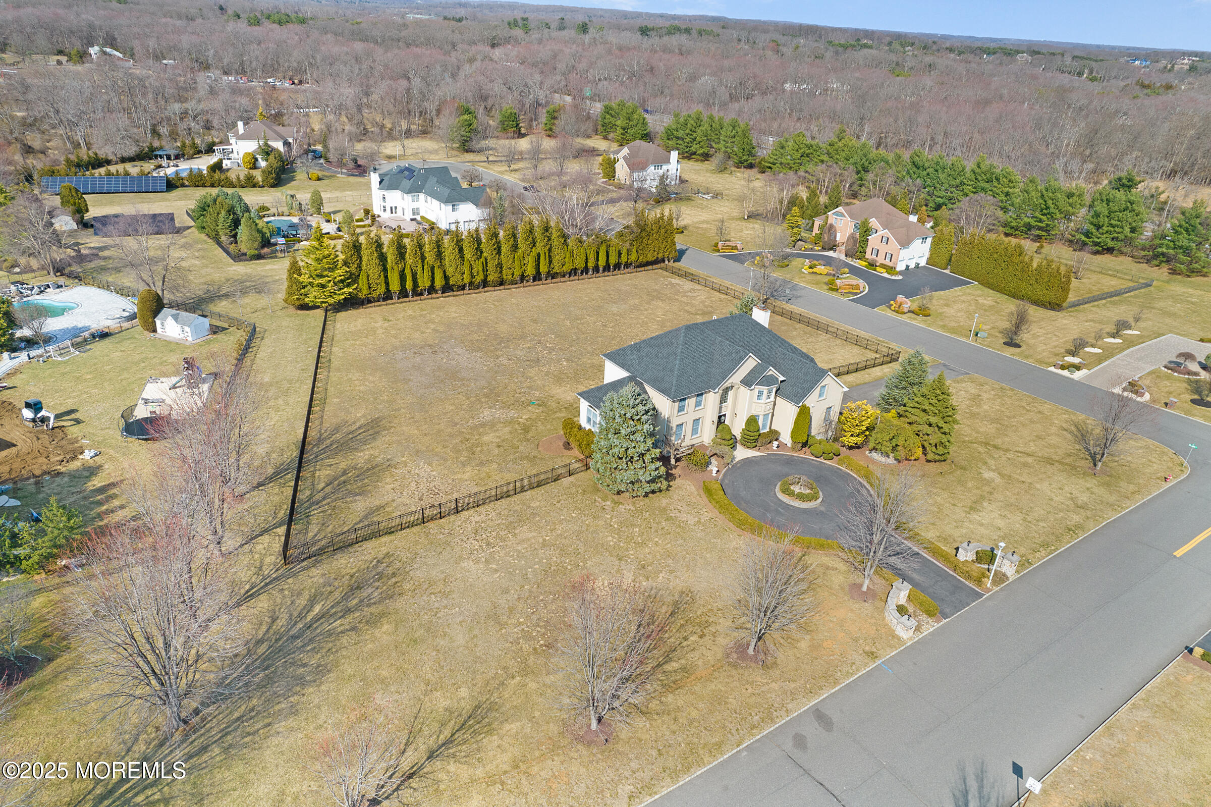 57 Moore Road Marlboro, NJ 07746 - Photo 43 of 53 an aerial view of a house with a swimming pool
