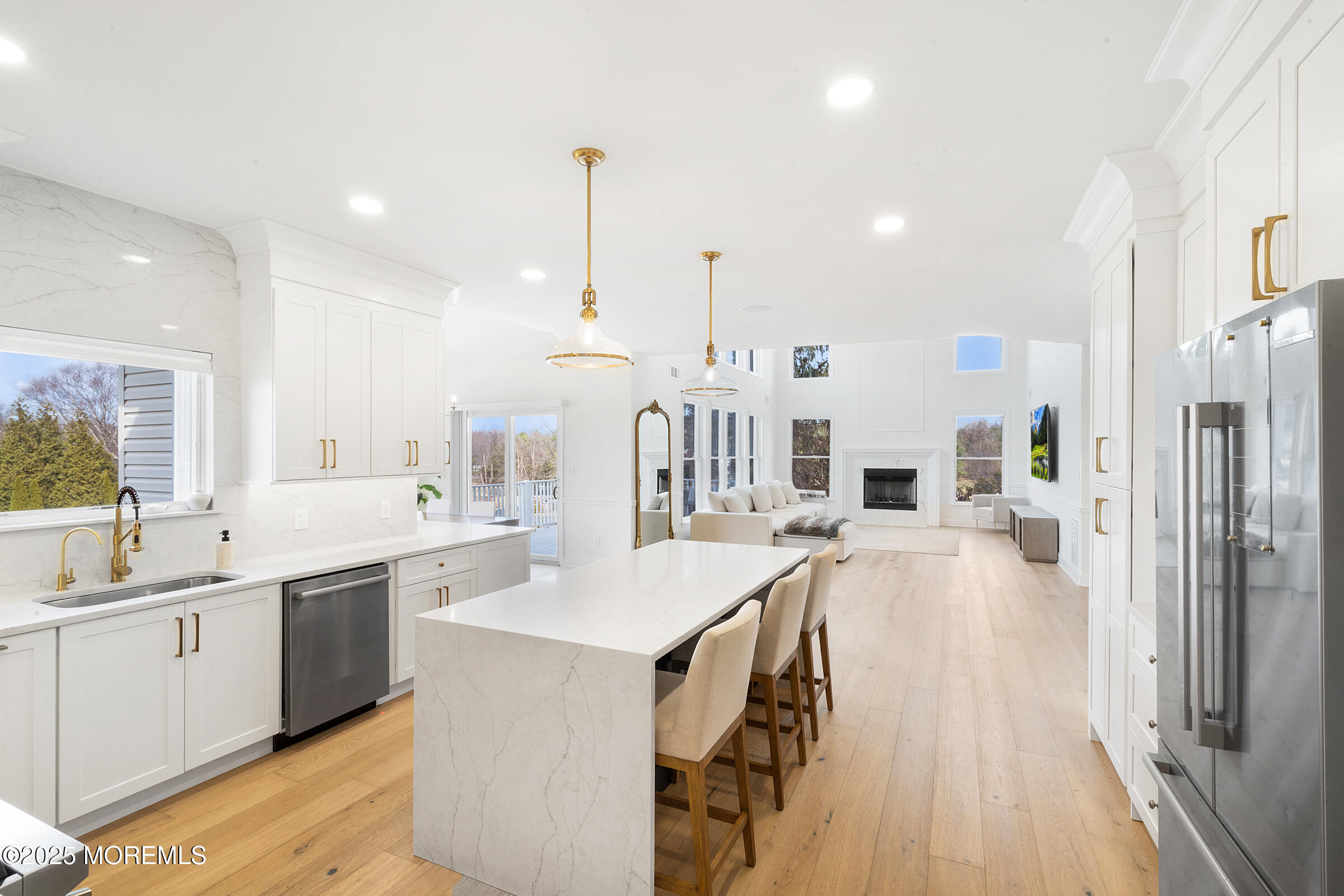 57 Moore Road Marlboro, NJ 07746 - Photo 7 of 53 a large kitchen with kitchen island a sink appliances and a counter top space