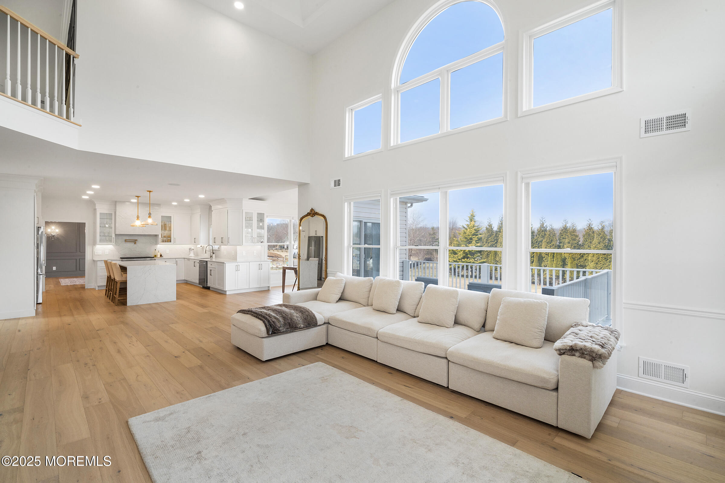 57 Moore Road Marlboro, NJ 07746 - Photo 10 of 53 a living room with furniture and a large window