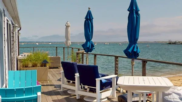 a view of a swimming pool and an ocean view