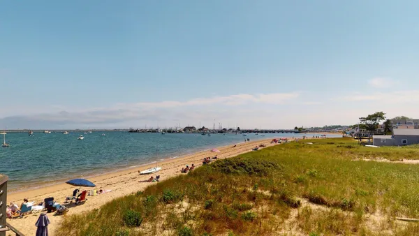 a view of dinning table and chairs in patio