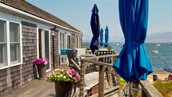 a view of a swimming pool with an ocean view
