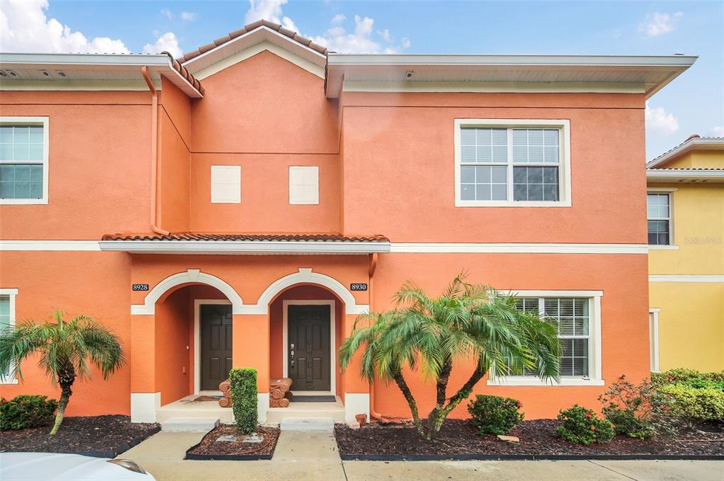 8930 Cuban Palm Road Kissimmee, FL 34747 - Photo 1 of 1 a front view of a house with garden