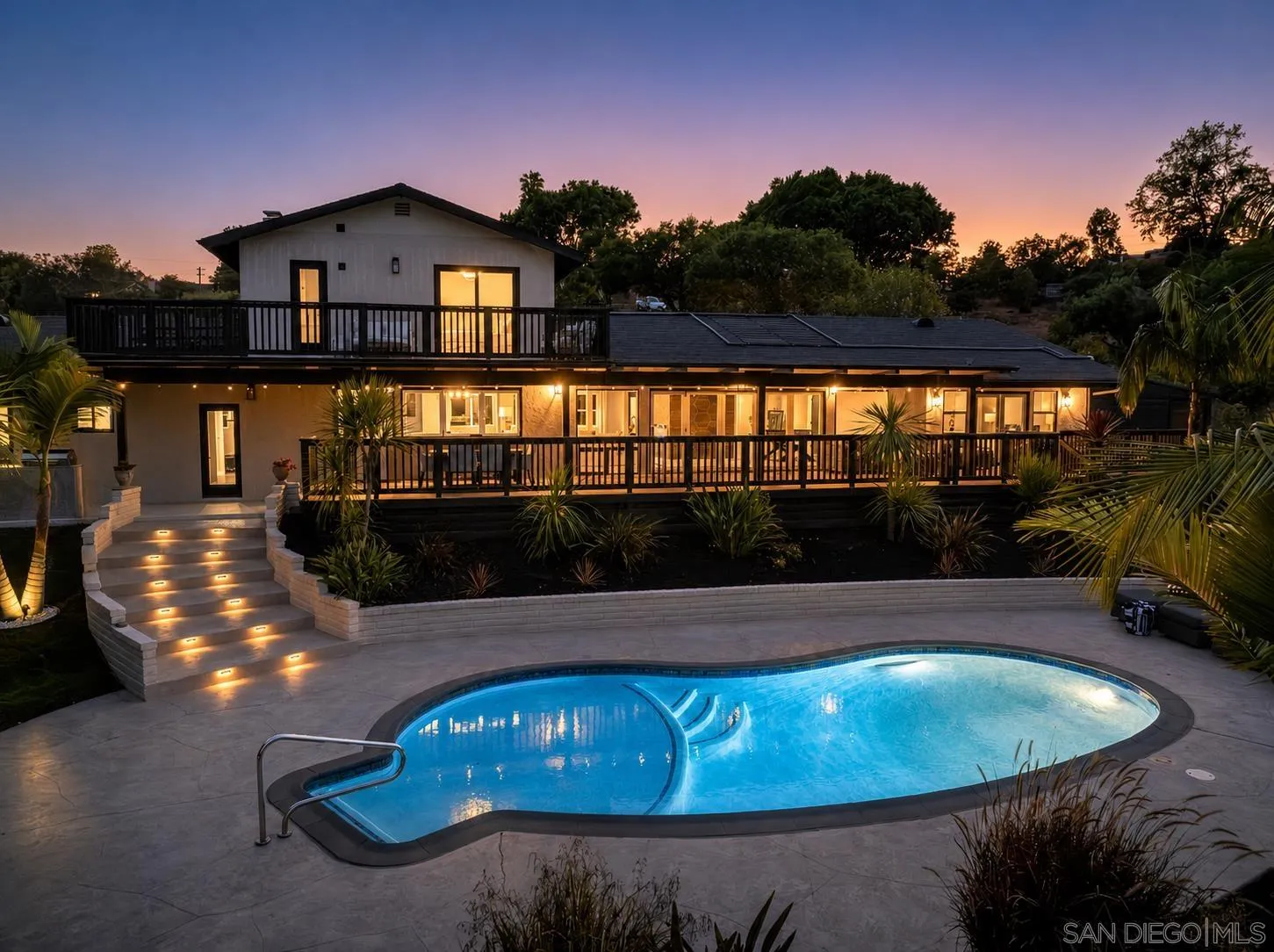 521 Rancho Camino Fallbrook, CA 92028 - Photo 2 of 72 a view of a swimming pool with an outdoor space and seating area