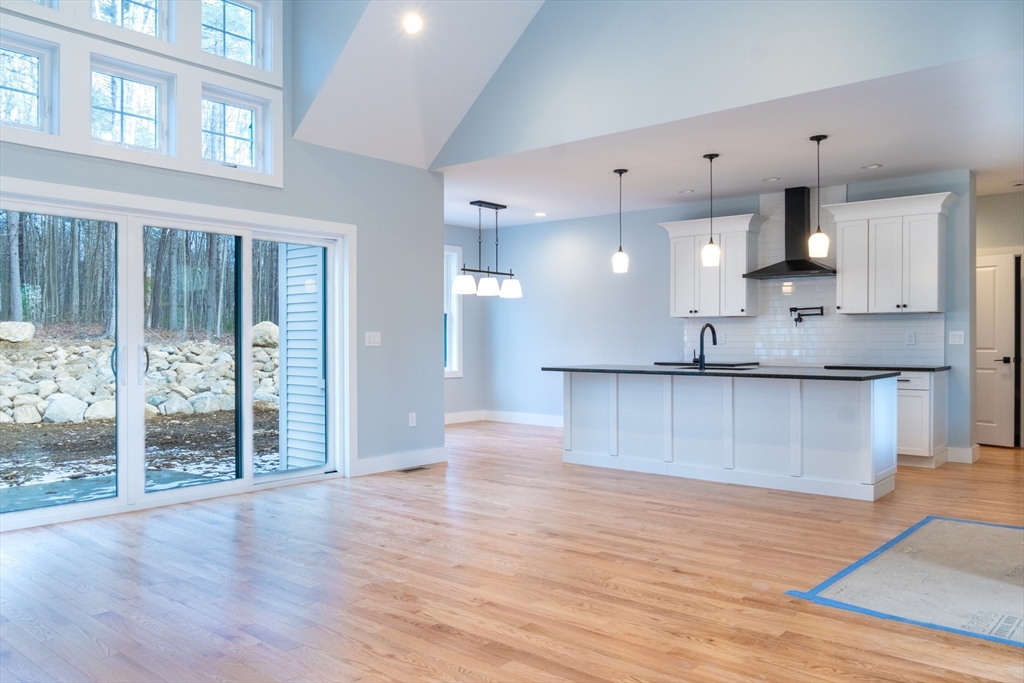 30 Red Bridge Road Wilbraham, MA 01095 - Photo 2 of 2 a view of kitchen with wooden floor and window