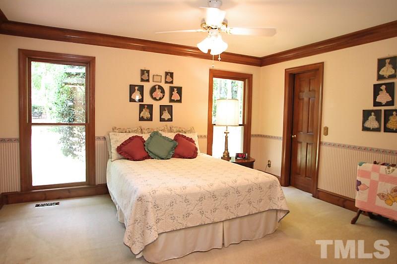 12332 Galway Drive Raleigh, NC 27613 - Photo 12 of 25 Additional bedroom on the first floor offers many possibilities.