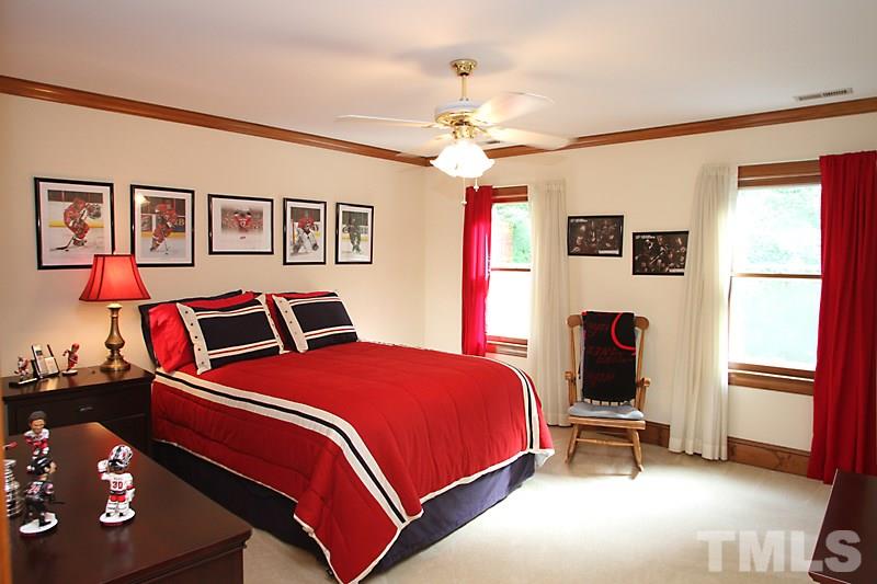 12332 Galway Drive Raleigh, NC 27613 - Photo 19 of 25 Second of the two bedrooms upstairs. Large, bright bedroom with plenty of closet space.