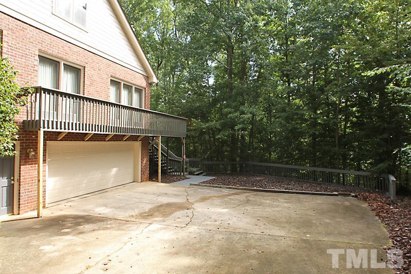 12332 Galway Drive Raleigh, NC 27613 - Photo 24 of 25 Basement garage is oversized. Perfect for your cars, and more!