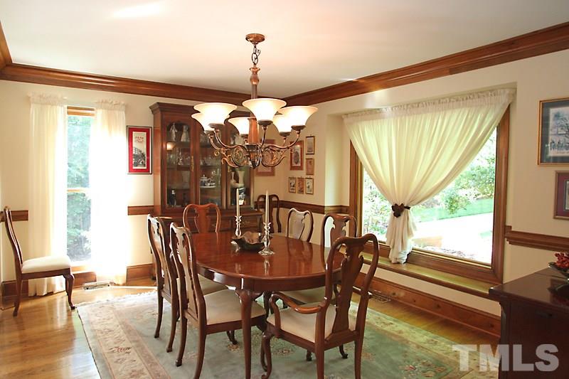 12332 Galway Drive Raleigh, NC 27613 - Photo 3 of 25 Dining Room offers large window over-looking the front of the home. Lots of space to entertain.