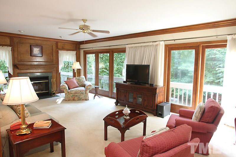 12332 Galway Drive Raleigh, NC 27613 - Photo 4 of 25 This family room is very spacious - offering a whole wall of windows. Notice the gas log fireplace for cozy winters and the open, beautiful windows for summer sunshine.
