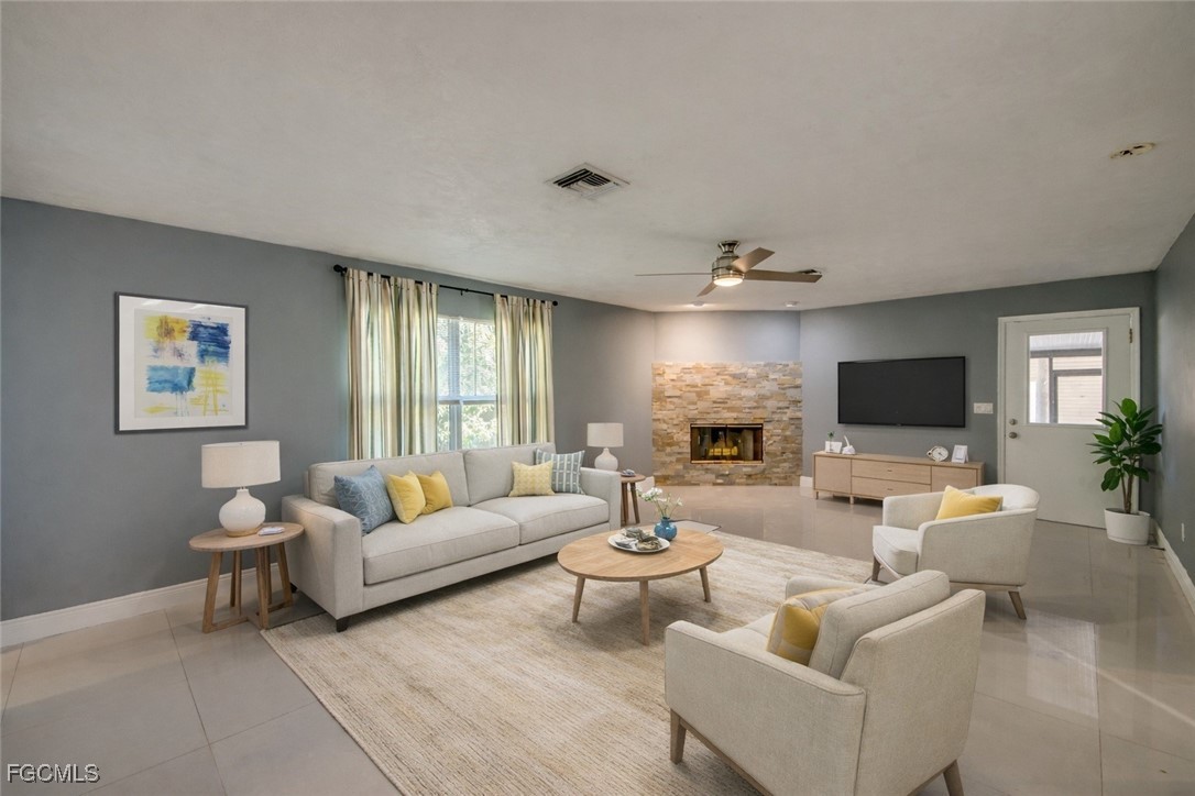 19330 Meredith Road North Fort Myers, FL 33917 - Photo 20 of 50 a living room with furniture and a flat screen tv