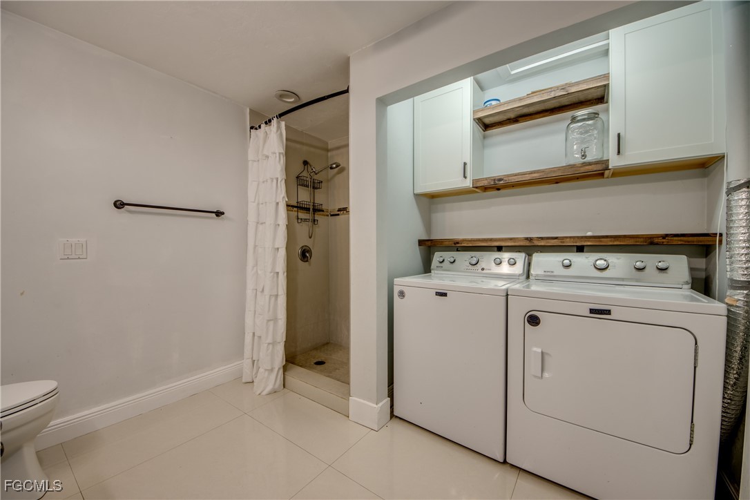 19330 Meredith Road North Fort Myers, FL 33917 - Photo 29 of 50 a view of a storage and utility room with washer and dryer