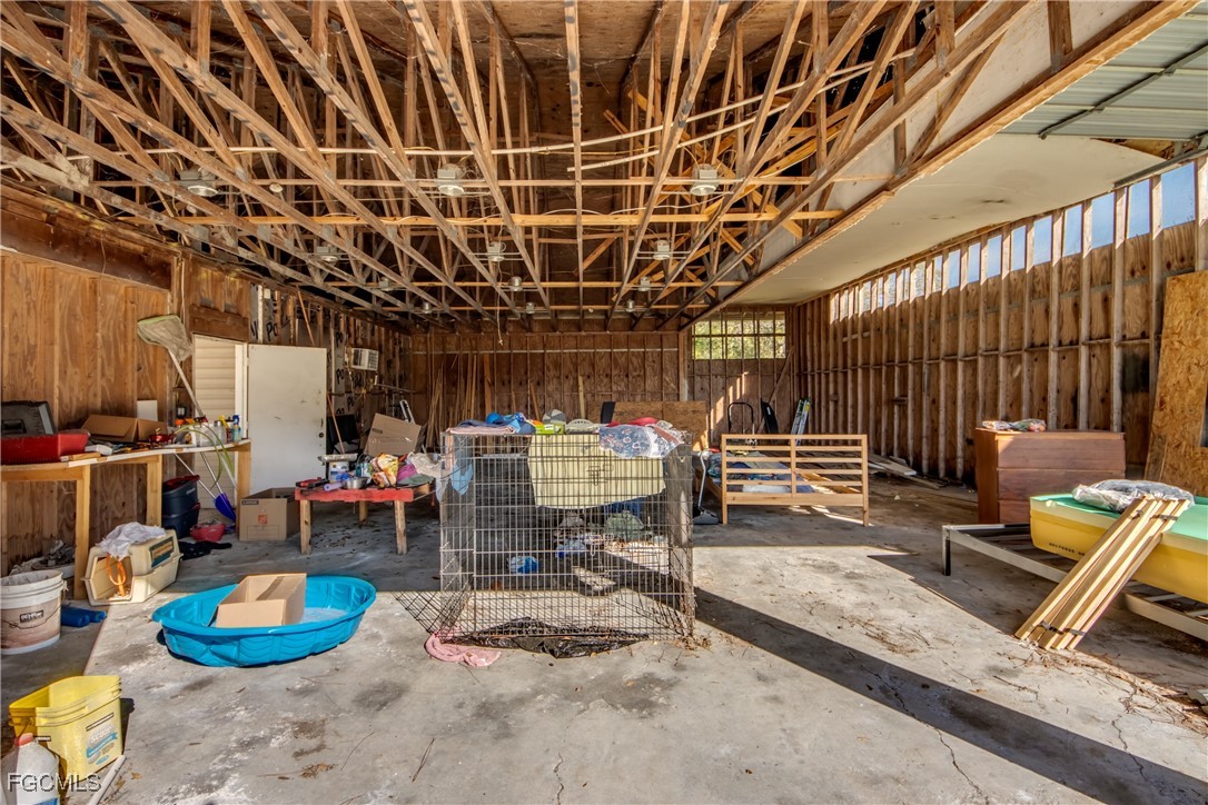 19330 Meredith Road North Fort Myers, FL 33917 - Photo 45 of 50 a view of a chairs and tables in patio