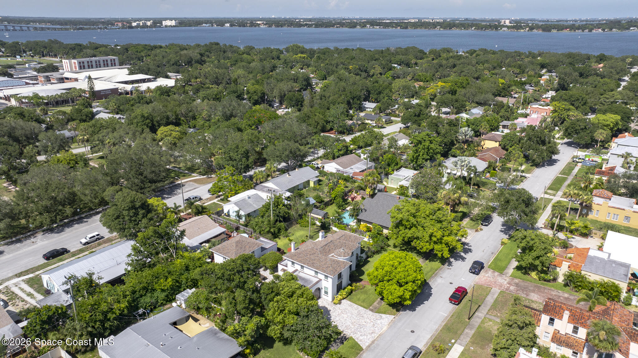130 Valencia Road Rockledge, FL 32955 - Photo 69 of 72 an aerial view of a houses with a yard