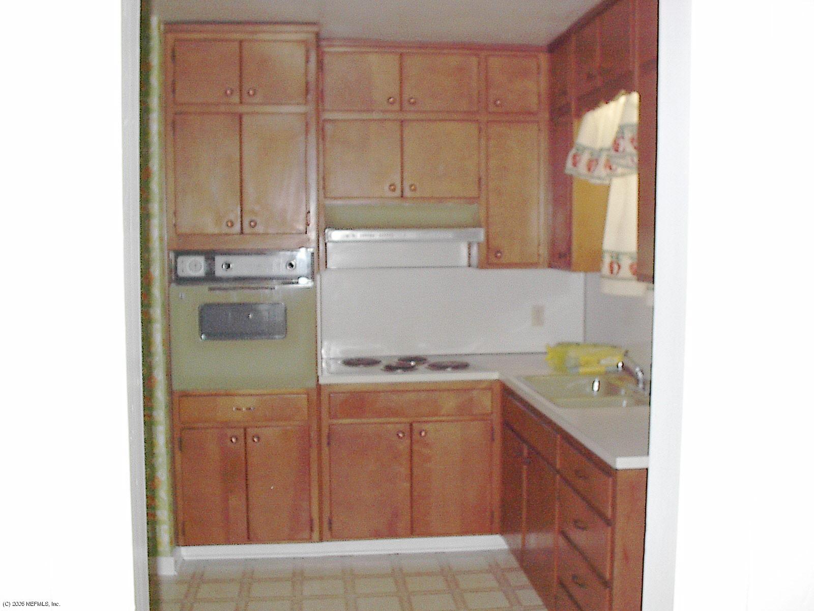 861 Old Hickory Road Jacksonville, FL 32207 - Photo 5 of 6 a kitchen with a sink and cabinets