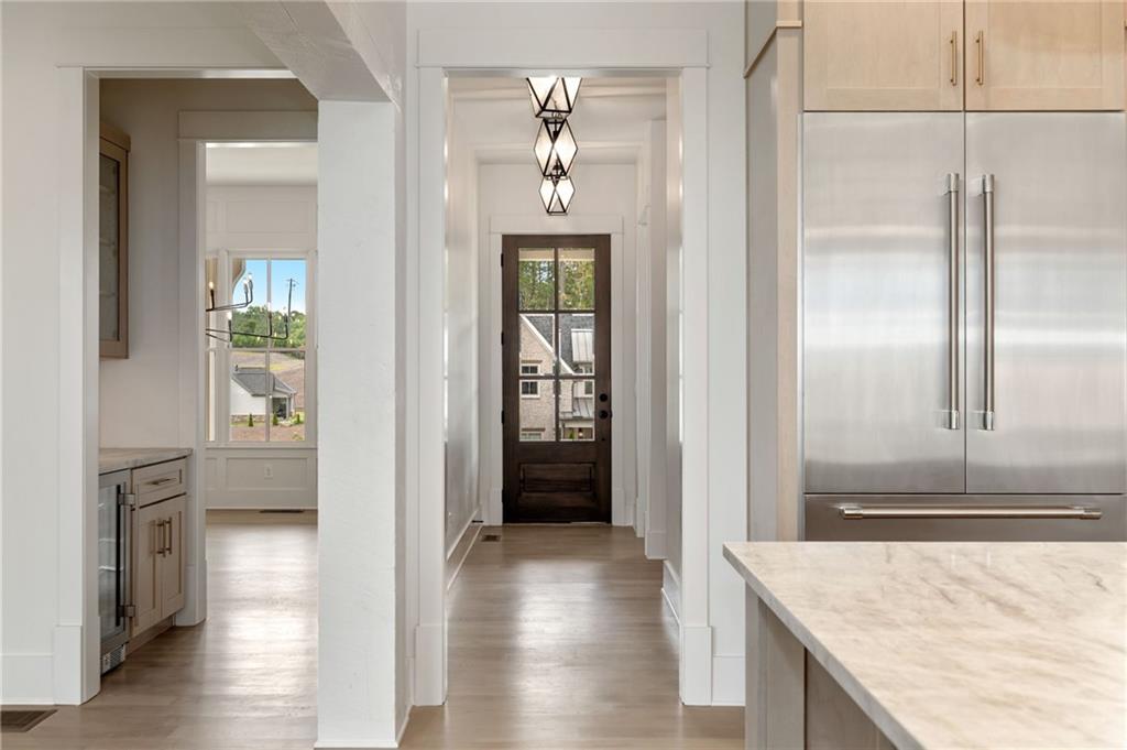 2701 Conns Creek Road, Unit 53 Ball Ground, GA 30107 - Photo 12 of 19 a view of a kitchen from the hallway