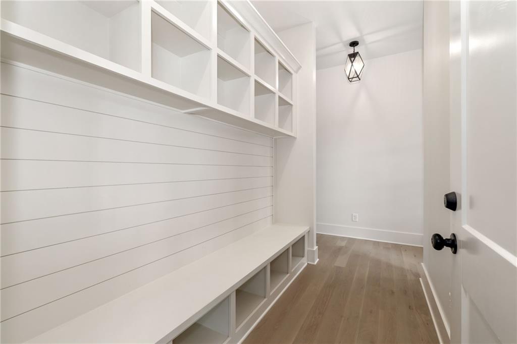 2701 Conns Creek Road, Unit 53 Ball Ground, GA 30107 - Photo 13 of 19 a bathroom with a bathtub and shower