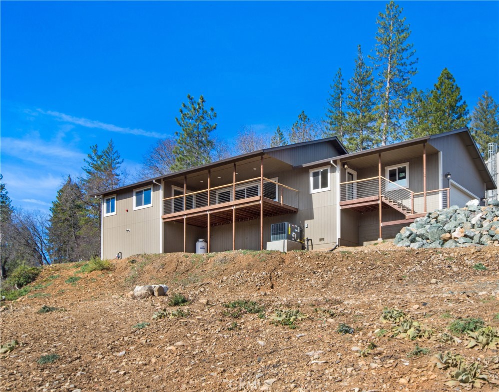 9781 Venturi Drive Cobb, CA 95426 - Photo 4 of 26 a front view of a house with a yard