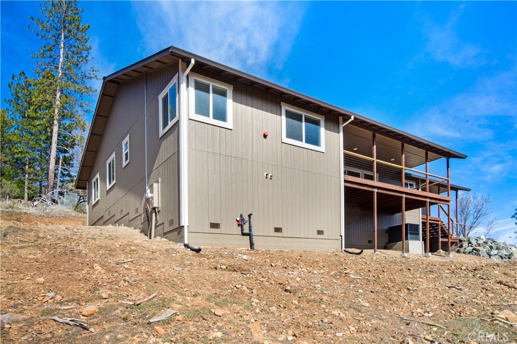 9781 Venturi Drive Cobb, CA 95426 - Photo 6 of 26 a front view of a house with a yard