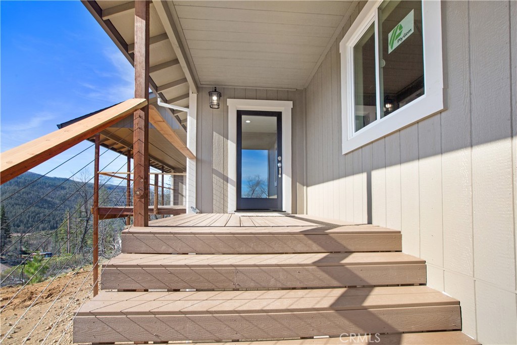 9781 Venturi Drive Cobb, CA 95426 - Photo 8 of 26 a front view of a house with a yard